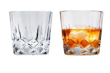 Perfect glasses of whiskey and ice isolated