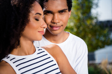 Fototapeta premium Photo of loving girl feel passionate her boyfriend have vacation outdoors urban city in green countryside