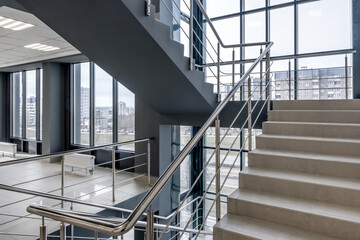 Fototapeta premium stairs emergency and evacuation exit stair in up ladder in a new office building.