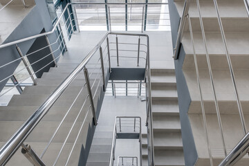 stairs emergency and evacuation exit stair in up ladder in a new office building.