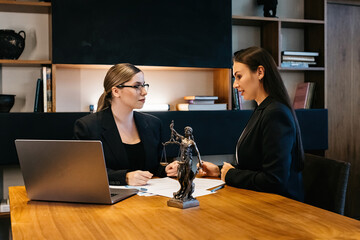 Consulting business woman lawyer or judge consultant holding a meeting with a client, concept of...