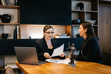 Consulting business woman lawyer or judge consultant holding a meeting with a client, concept of...