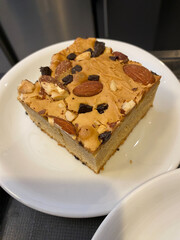 Blondie brownie dessert bar with chocolate chips and almond.