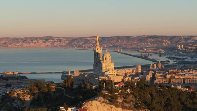 Aerial view of Notre Dame de La Garde and the Vieux Port in Marseille