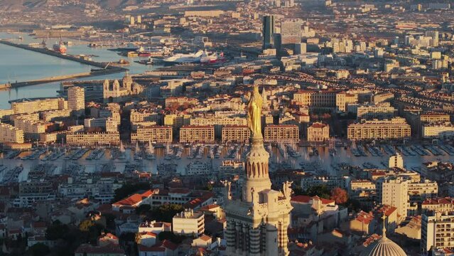 Aerial view of Notre Dame de La Garde and the Vieux Port in Marseille