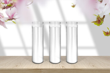 Classic wax candle in glass mockup empty shelf with light and window- shadow and magnolia flowers border
