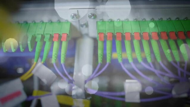 Animation of spots of light moving over computer servers