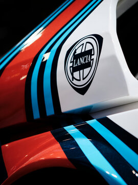 Geneva Intermational Motor Show, Switzerland March 3th 2024: Closeup photo of the Lancia car logo on a Delta S4 Rally car with Martini racing livery