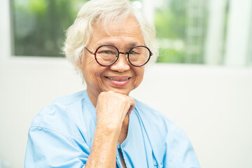 Asian senior woman wearing eyeglasses or vision glasses at home care service.