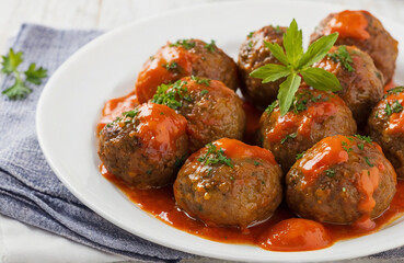 Frying pan of tasty meat balls with tomato sauce and basil. Generated AI