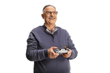 Happy mature man holding a drone remote cotroller