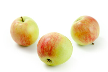 Three green apples isolated on white background with clipping path..