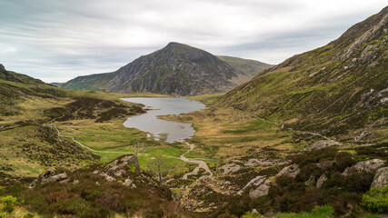 Stunning landscape photo of Llyn Idwal and the surround Ogwen Valley in Snowdonia National Park, Wales, UK