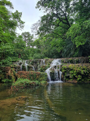 Fototapeta na wymiar nature, water, tree, waterfall, green, sky, blue 
