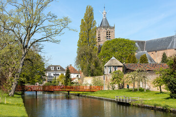Vianen in the Netherlands. 30 April 2023. Vianen cityscape with canal, church and the old city wall. Vianen is a city and a former municipality in the central Netherlands, in the province of Utrecht.