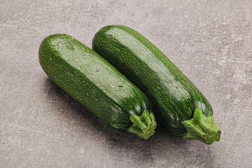 Raw green ripe zucchini vegetable