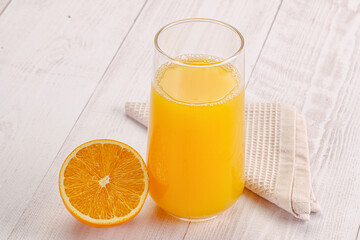 Sweet fresh orange juice in the glass