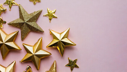 Golden Stars on Pink Background Festive and Elegant Top View Composition with Sparkling Decorations
