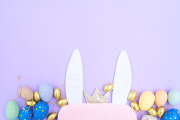 Easter scene with colored eggs and rabbit's ears