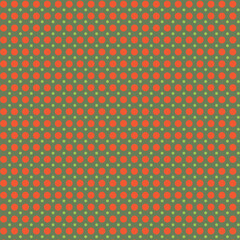 Web  A polka dot pattern of orange and green spots on a green background.