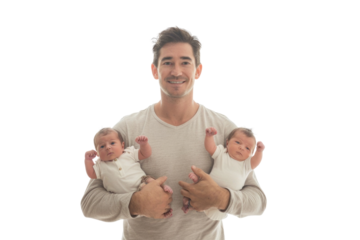 Father proud of his newborn twin babies