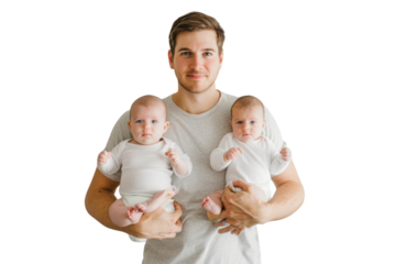 Father proud of his newborn twin babies