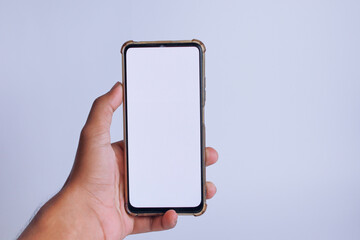 a cellphone held with a white screen on a white background
