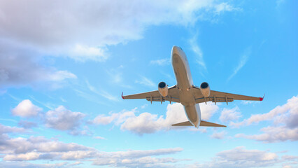 White passenger airplane flying in the sky amazing clouds in the background - Travel by air transport