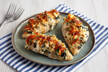 Homemade Hasselback Chicken on a Plate, side view.
