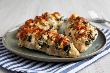 Homemade Hasselback Chicken on a Plate, side view.