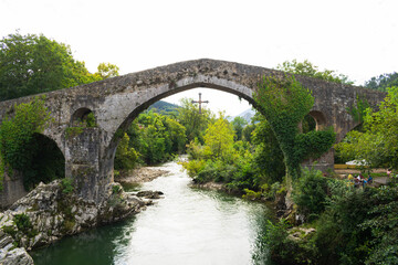 Fototapeta na wymiar Ancient Roman Bridge of Cangas de Onis. Asturias - Spain