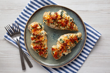 Homemade Hasselback Chicken on a Plate, top view. Flat lay, overhead, from above.