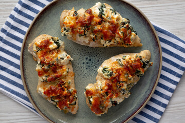 Homemade Hasselback Chicken on a Plate, top view. Flat lay, overhead, from above.