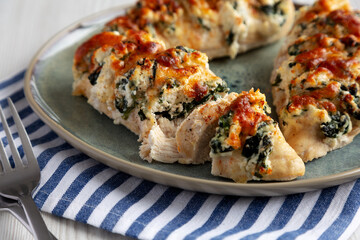 Homemade Hasselback Chicken on a Plate, side view. Close-up.