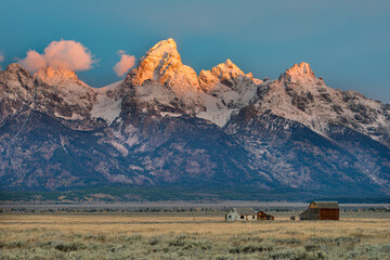 Teton Range and Mormon Row Historic District at Antelope Flats in Grand Teton National Park during sunrise in Wyoming