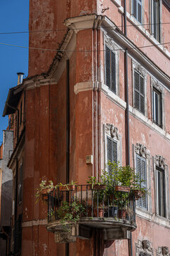 Balcony on classic traditional building in Rome, Italy