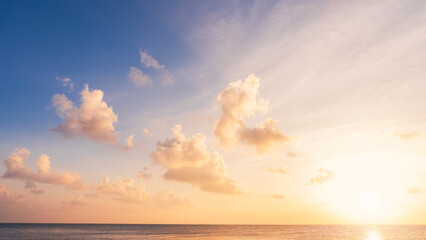 Fototapeta na wymiar sunset sky with clouds over sea, horizon sea sky landscape background 