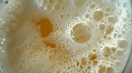 Close up of beer with foam.