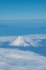 Plane View of Mountain Fuji surrounded by sea of clouds, Japan