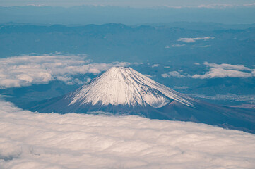 Plane View of Mountain Fuji surrounded by sea of clouds, Japan