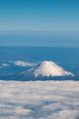 Plane View of Mountain Fuji surrounded by sea of clouds, Japan