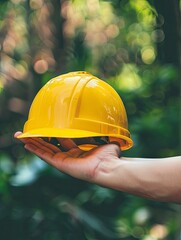 Hand or arm of engineer hold yellow plastic helmet for worker. Labor day concept - generative ai