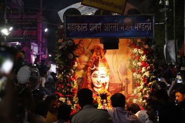 people at the procession of lord shiva in ujjain city