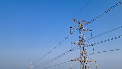 Electrical energy in nature clean energy concept and high voltage tower