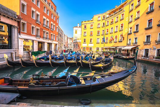 Bacino Orseolo channel gondolas and colorful architecture of Venice view
