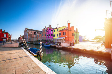 Island of Burano colorful houses and channel sunset view