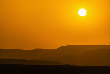 Sun setting over the desert in Luxor, Egypt - 753039609