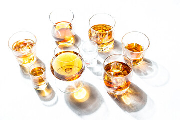 Strong alcohol drink. Cognac, whisky, rum, tequila at white background.