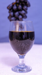 Glass of tasty dark wine Glass