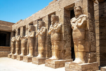 Row of statues of Pharaoh Ramesses III in Karnak temple in Luxor, Egypt - 753040845